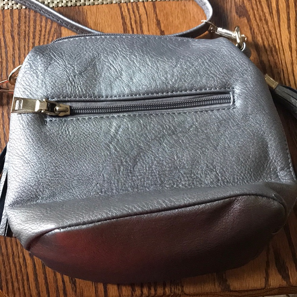 Purse with Conceal Carry includes Blackhawk holster size 4